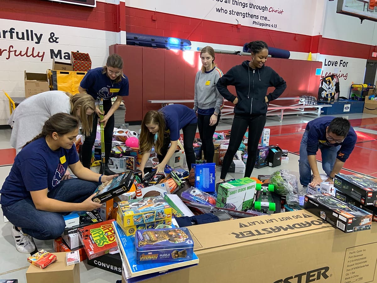 group sorting toy drive donations