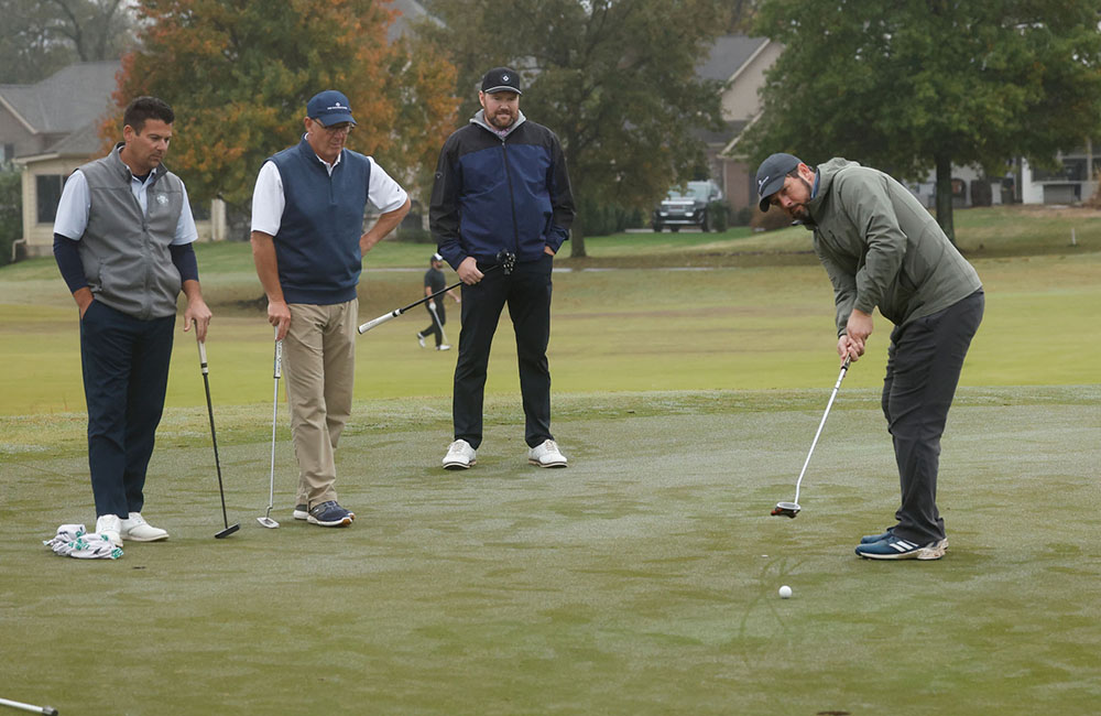 golfers putting at sumner golf classic 2025